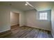 Finished basement area with neutral paint, modern trim and window offering natural light at 515 Allens Landing Ct, Lawrenceville, GA 30045