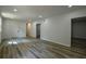 Spacious basement area with sleek flooring and ample recessed lighting at 515 Allens Landing Ct, Lawrenceville, GA 30045
