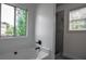 Bright bathroom featuring a large soaking tub and a separate shower with tiled wall at 515 Allens Landing Ct, Lawrenceville, GA 30045