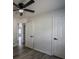 Neutral bedroom showcasing modern ceiling fan and vinyl plank flooring at 515 Allens Landing Ct, Lawrenceville, GA 30045