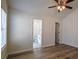 Primary bedroom with en-suite bathroom access, and two large windows at 515 Allens Landing Ct, Lawrenceville, GA 30045