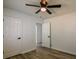 Neutral bedroom showcasing modern ceiling fan and vinyl plank flooring at 515 Allens Landing Ct, Lawrenceville, GA 30045