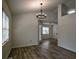 This dining room offers lots of light and access to the back of the home at 515 Allens Landing Ct, Lawrenceville, GA 30045