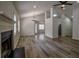 Spacious living room with hardwood floors, a fireplace, and an open floor plan at 515 Allens Landing Ct, Lawrenceville, GA 30045
