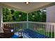 Relaxing porch furnished with seating and plants, offering a peaceful outdoor retreat at 515 Allens Landing Ct, Lawrenceville, GA 30045
