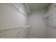 Spacious walk-in closet providing ample storage space with wire shelving units at 515 Allens Landing Ct, Lawrenceville, GA 30045