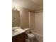 Clean bathroom featuring shower/tub, white toilet, and vanity with sink at 7250 Bridgeport Ct, Austell, GA 30168