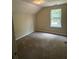Bedroom with natural light from the window at 7250 Bridgeport Ct, Austell, GA 30168