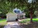 Charming home with attached garage and a well-maintained front yard at 7250 Bridgeport Ct, Austell, GA 30168