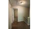 Carpeted hallway leading to bedrooms on the second floor at 7250 Bridgeport Ct, Austell, GA 30168