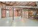 Unfinished basement showcasing exposed ceilings, and ample space for storage or customization at 3937 Locklear Way, Atlanta, GA 30360