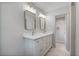 Bright bathroom featuring double vanity, modern fixtures, and marble floors at 3937 Locklear Way, Atlanta, GA 30360