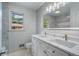 Elegant bathroom featuring a double vanity, stone countertops and decorative tile at 3937 Locklear Way, Atlanta, GA 30360