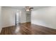 Spacious bedroom features hardwood floors, ceiling fan, an ensuite bathroom, and closet at 3937 Locklear Way, Atlanta, GA 30360