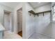 Spacious closet with custom wood shelf and nearby shower at 3937 Locklear Way, Atlanta, GA 30360