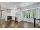Bright kitchen and dining space featuring stainless appliances and views of wooded lot at 3937 Locklear Way, Atlanta, GA 30360