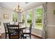 Charming dining area with large windows providing scenic outdoor views at 4967 Jett Rd, Marietta, GA 30066