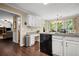 Open-concept kitchen design with white cabinetry and modern appliances at 4967 Jett Rd, Marietta, GA 30066