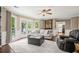 Bright living room with view to the backyard and access to the kitchen at 4967 Jett Rd, Marietta, GA 30066