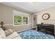 Inviting living room with natural light, hardwood floors, area rug and comfortable seating at 4967 Jett Rd, Marietta, GA 30066