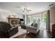 Inviting living room boasts a cozy fireplace and large windows at 4967 Jett Rd, Marietta, GA 30066