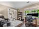 Comfortable home office featuring a large window and desk with dual monitors at 4967 Jett Rd, Marietta, GA 30066