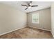 Comfortable bedroom with neutral walls, plush carpet, and plenty of natural light at 586 Chris Cir, Lawrenceville, GA 30044