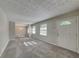 Spacious living area featuring modern paint, new carpet, and natural light at 586 Chris Cir, Lawrenceville, GA 30044