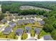 Aerial view of a well manicured neighborhood surrounded by lush greenery and beautiful homes at 829 Overlook Path Ln, Lawrenceville, GA 30045