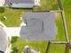 Overhead view of gray roof house with a spacious, well-maintained yard and a wooden pergola at 829 Overlook Path Ln, Lawrenceville, GA 30045