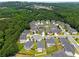 Overhead aerial view of houses in neighborhood surrounded by greenery and cul-de-sac streets at 829 Overlook Path Ln, Lawrenceville, GA 30045