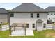 Aerial view of backyard, features a backyard wooden pergola and private fenced backyard at 829 Overlook Path Ln, Lawrenceville, GA 30045