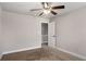 Bedroom featuring ceiling fan and door at 829 Overlook Path Ln, Lawrenceville, GA 30045
