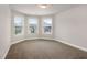 Bedroom featuring 3 windows providing natural light at 829 Overlook Path Ln, Lawrenceville, GA 30045