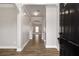 Inviting entryway showcasing a sleek, dark wood floor, neutral paint, and elegant trim at 829 Overlook Path Ln, Lawrenceville, GA 30045