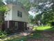 Backyard featuring lush green grass, perfect for outdoor activities and relaxation at 2505 King Louis Rd, Conyers, GA 30012