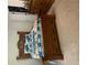 A well lit main bedroom with a decorative wooden bed and plenty of natural light at 2505 King Louis Rd, Conyers, GA 30012