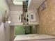 Functional kitchen with white cabinets, tile flooring, and white appliances, providing a clean cooking space at 2505 King Louis Rd, Conyers, GA 30012
