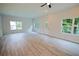 Bright and airy living room featuring luxury vinyl plank flooring and natural light at 275 Green Commons Dr, Covington, GA 30016