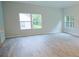 Bright living area with luxury vinyl plank flooring and natural light at 275 Green Commons Dr, Covington, GA 30016