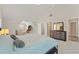Bright and airy main bedroom with vaulted ceilings, walk in closets, and an ensuite bathroom with tile flooring at 403 Sonja Ln, Loganville, GA 30052