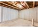 Unfinished basement with exposed ceiling is ready for customization at 992 Belfry Ter, Fairburn, GA 30213