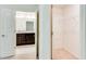 Functional walk-in closet with shelving, providing ample storage space and organization at 992 Belfry Ter, Fairburn, GA 30213