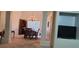 Elegant dining area with chandelier, window, and decorative wall trim at 999 Simonton Glen Dr, Lawrenceville, GA 30045