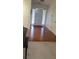 Inviting foyer with hardwood floors, front door and sidelight windows at 999 Simonton Glen Dr, Lawrenceville, GA 30045