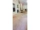 Living room features a fireplace, TV, and natural light through large windows at 999 Simonton Glen Dr, Lawrenceville, GA 30045