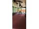 Enclosed sunroom with windows offering natural light and views of the backyard at 999 Simonton Glen Dr, Lawrenceville, GA 30045