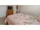 Cozy bedroom with floral bedding, soft carpet, and neutral walls for a relaxing space at , Loganville, GA 30052