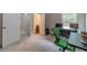 Spacious bedroom / office with carpeting and view of en-suite bathroom at , Loganville, GA 30052