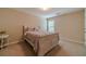 This cozy bedroom features a queen bed, neutral walls, and soft carpeting for a comfortable retreat at , Loganville, GA 30052